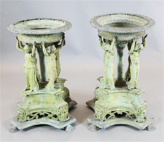 A pair of lead garden urns, W.1ft 6in. H.2ft 5in.